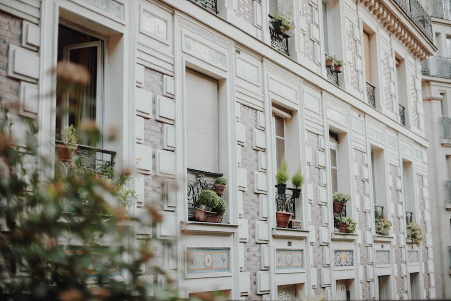 Beautiful parisian building with ornate facade details.