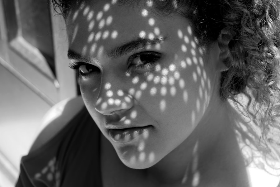 A woman with her face painted like a butterfly