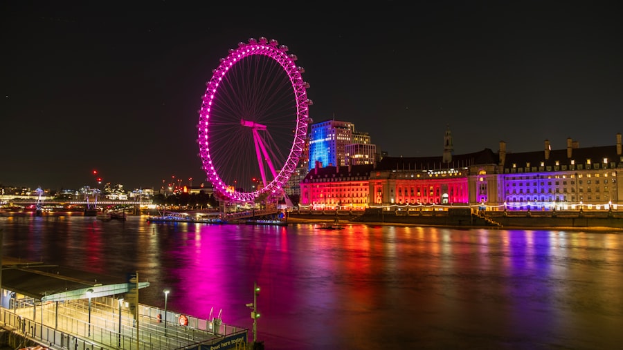 A ferris wheel lit up in the night sky