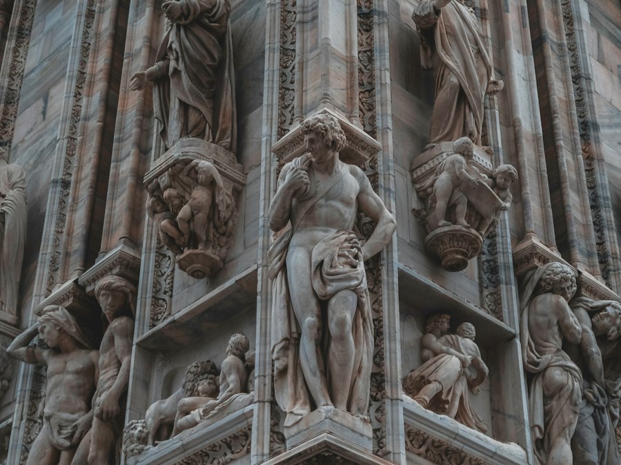 brown concrete statue of man