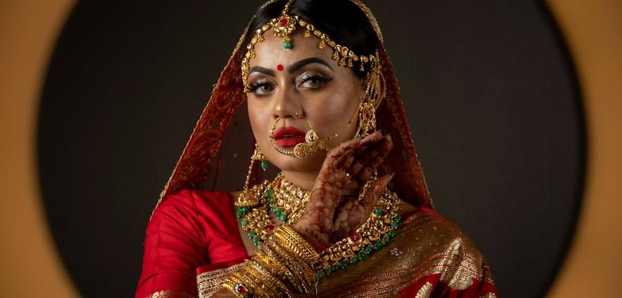 woman in red and gold sari