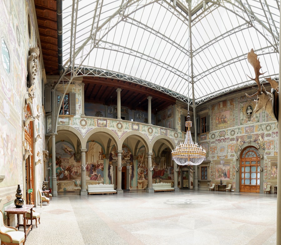 a large room with a chandelier hanging from the ceiling