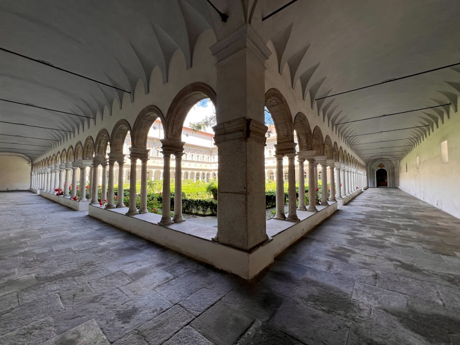 Arched cloister walkway with a courtyard garden courtyard