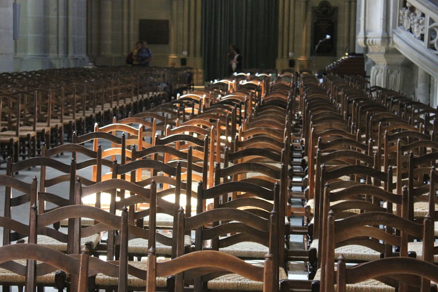 a large room with rows of chairs
