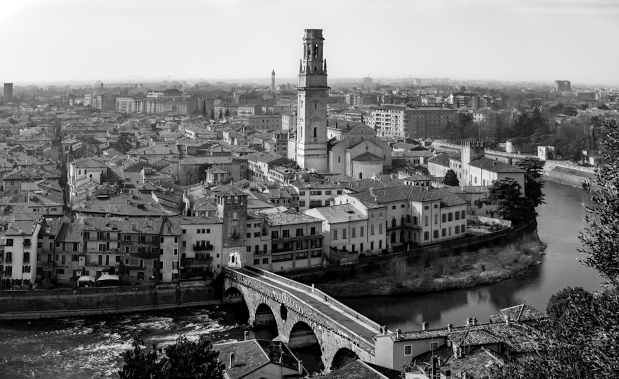 Historic european city skyline with river and bridge.