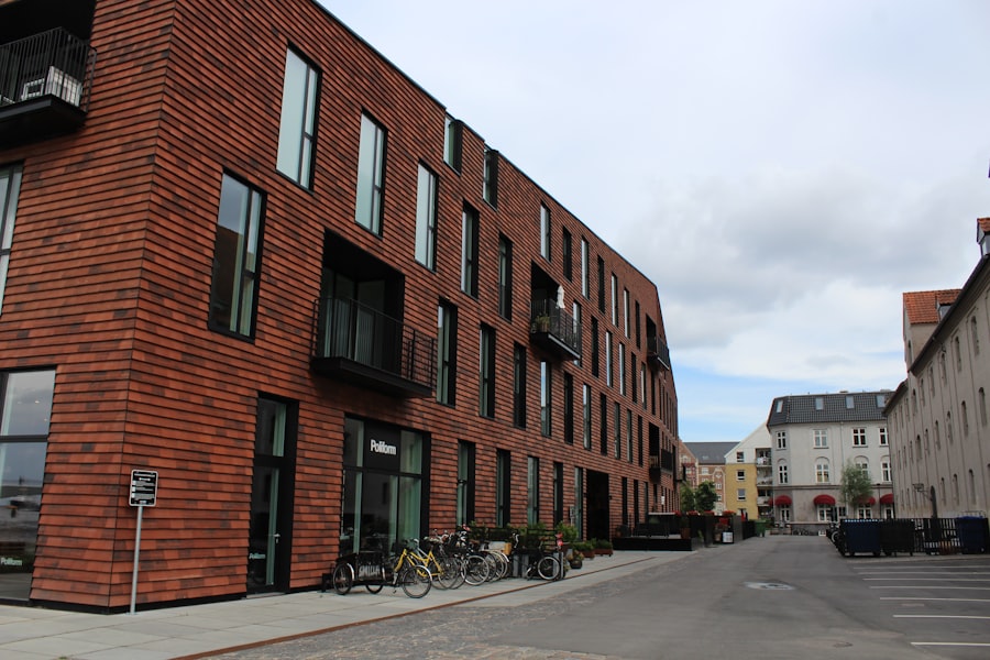 a row of bicycles parked on the side of a street