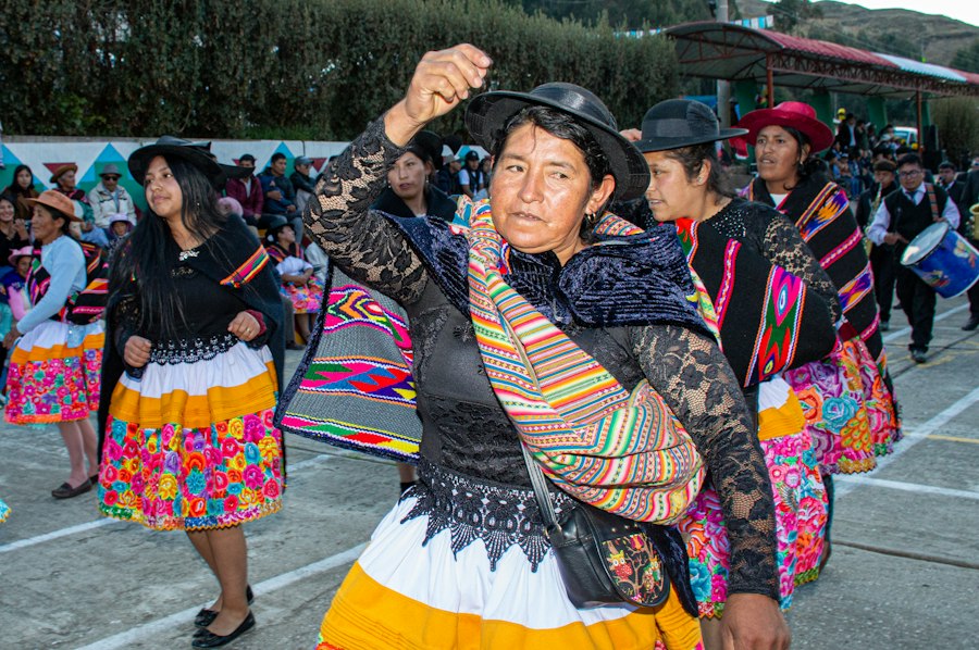 a group of people dressed in colorful clothing