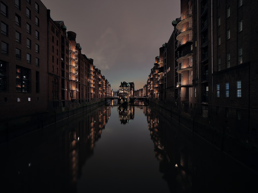 brown concrete building near body of water during daytime