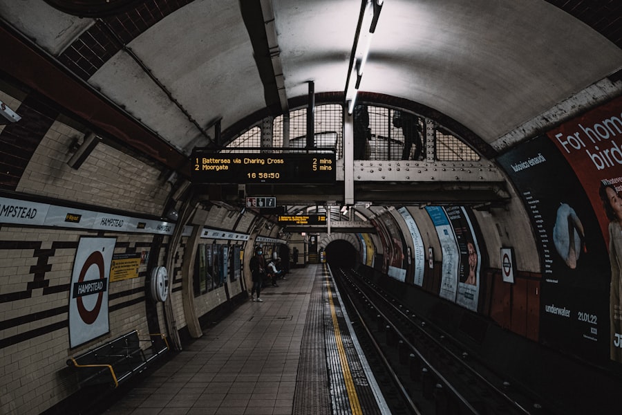 a subway station with a train on the tracks