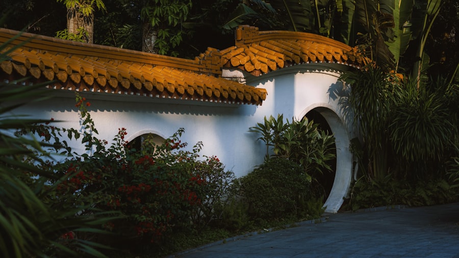 White building with orange tiled roof and arched doorway