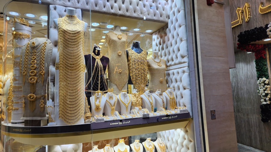 a display case filled with lots of gold jewelry