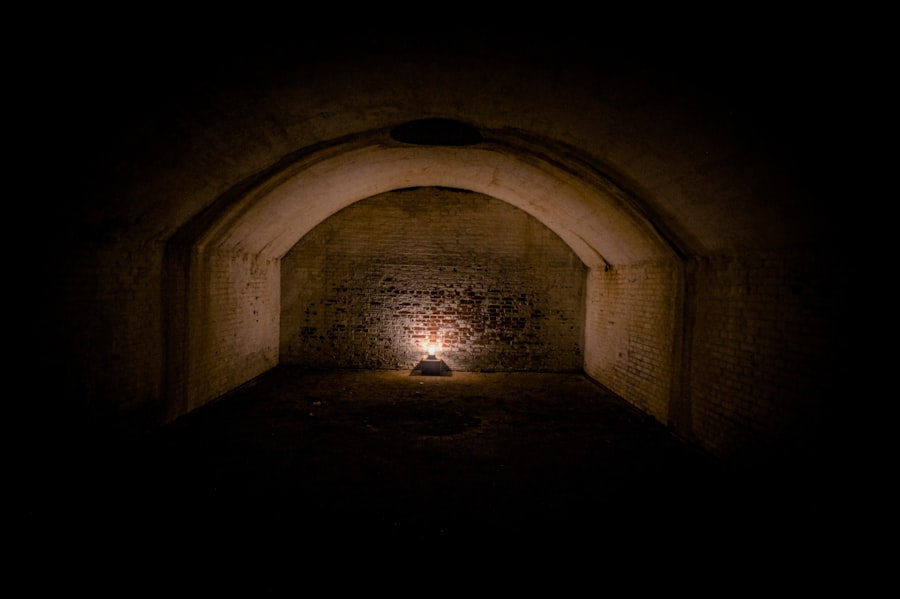 a dark tunnel with a light at the end