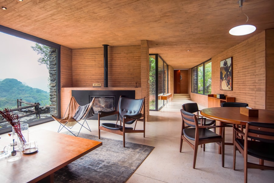 Modern living room with mountain views and a dining area
