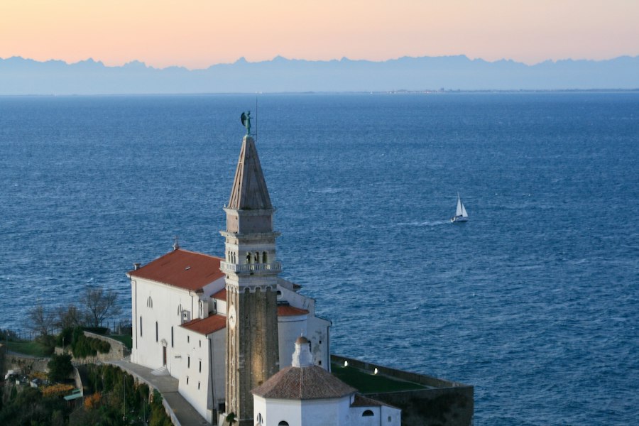 A church on a cliff overlooking the ocean