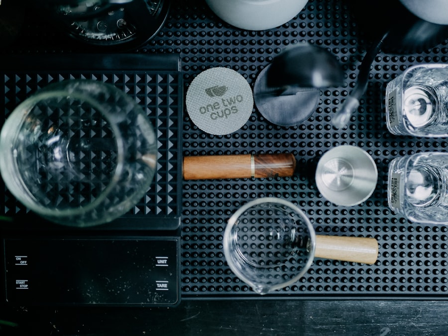 A table topped with lots of glasses and bottles
