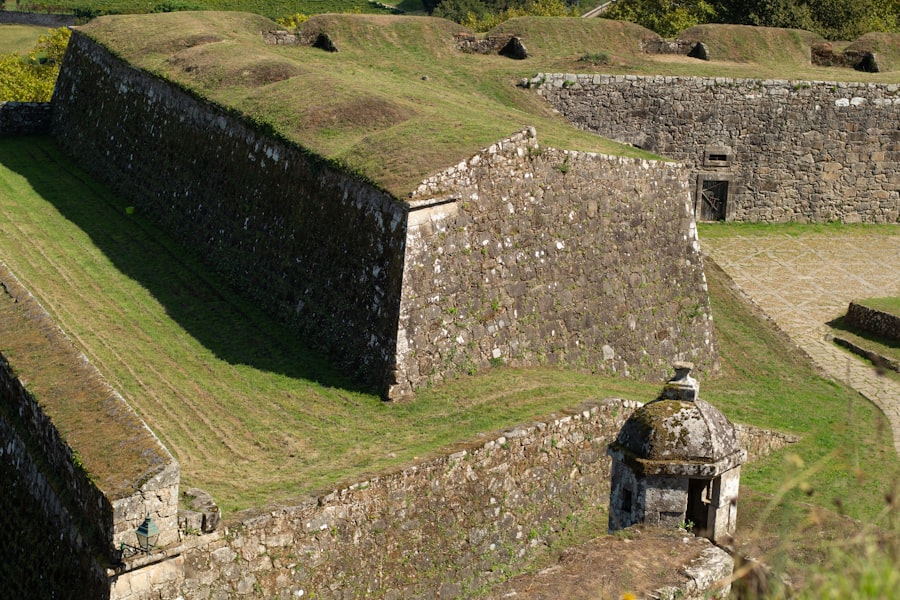 Stone fortress walls covered in green grass