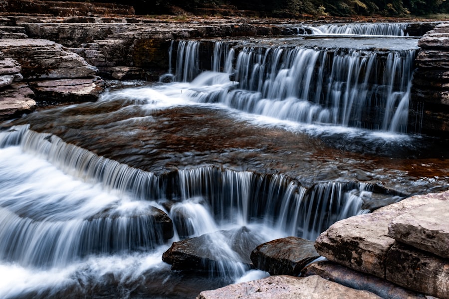a large waterfall with lots of water coming out of it