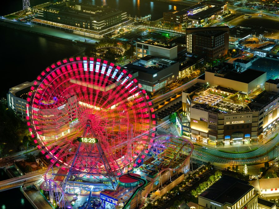 An aerial view of a ferris wheel at night