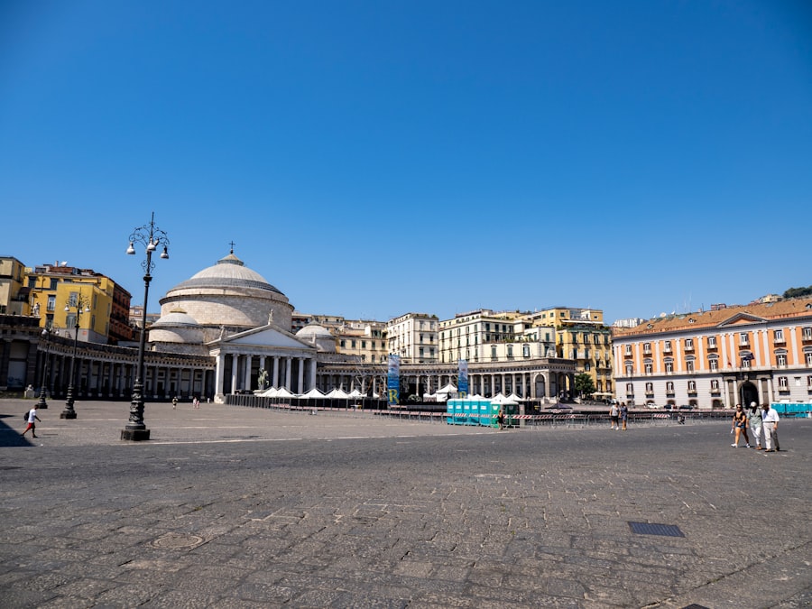 A city square with a large building in the background