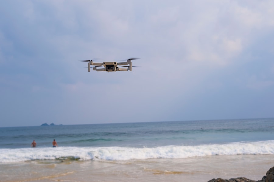 white drone flying over the sea during daytime