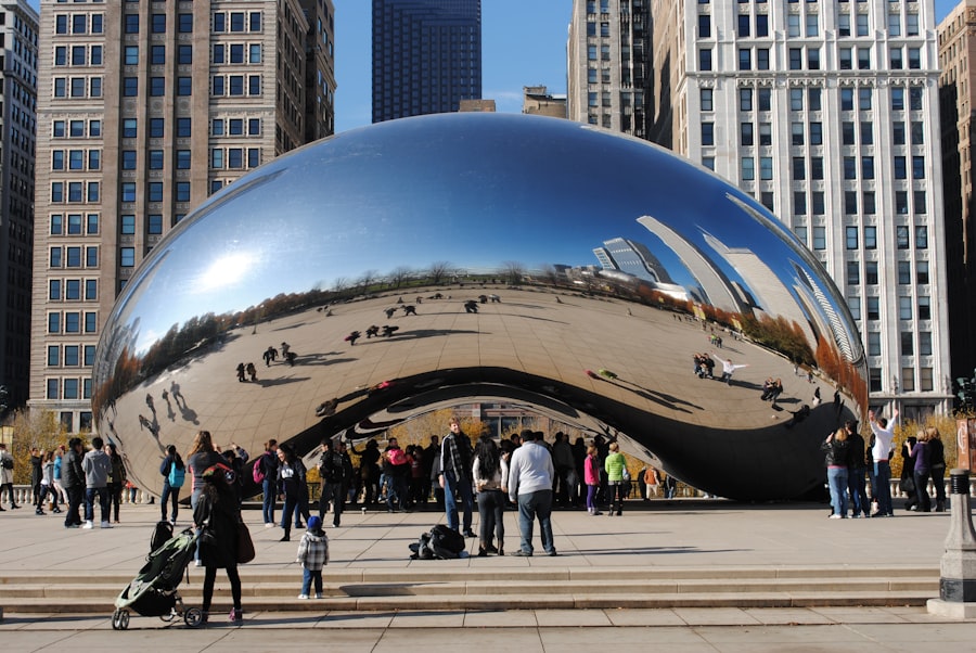 people walking on street near cloud gate during daytime