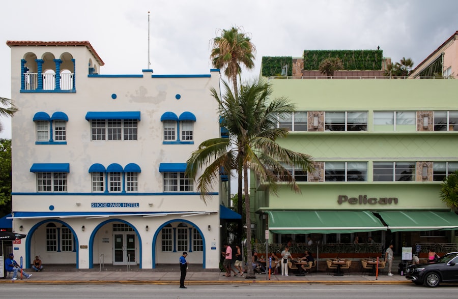 A white building with blue trim on a street corner