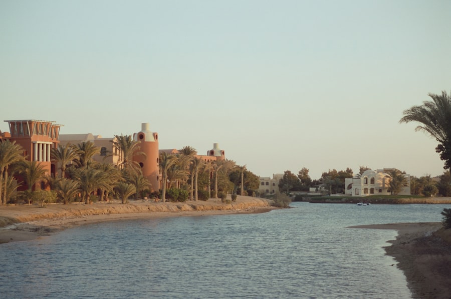 Golden light on moorish buildings along calm lagoon