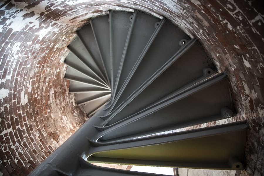 a spiral staircase in an old brick building