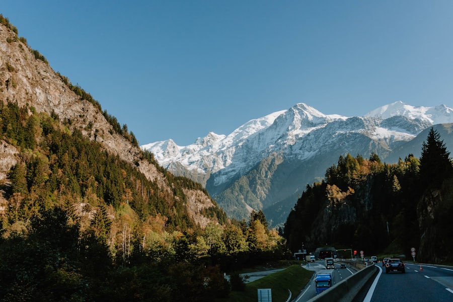 a view of a mountain range from a highway